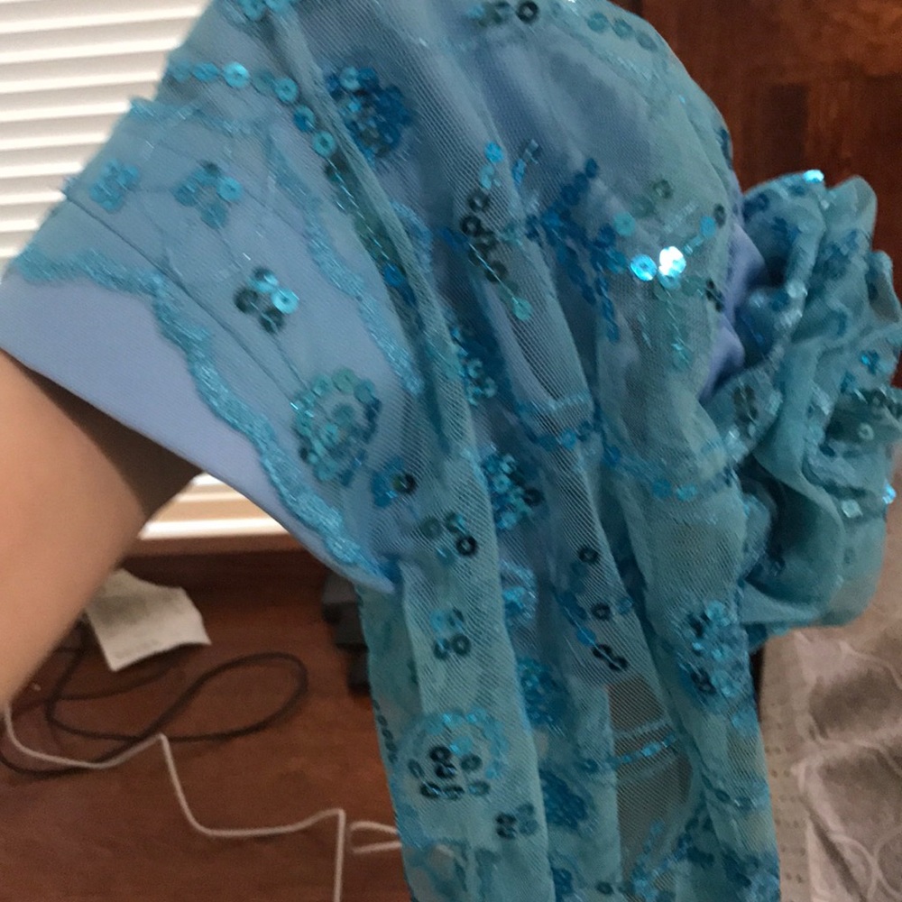 A light blue sequins cap hijab